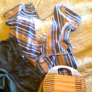 Top only for sale.  Cute wrap around style top.  Adorable with 🩳, 👖 or skirt!